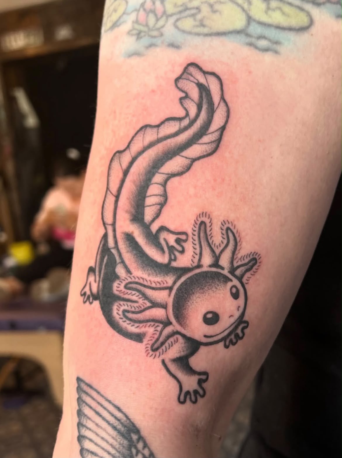 Axolotl tattoo on the arm